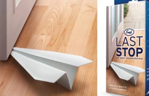 A door stop that looks like a paper plane