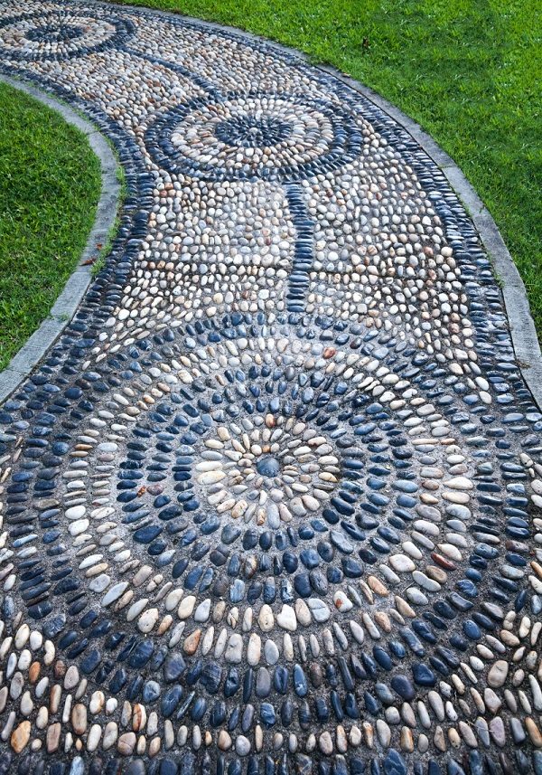 A Garden Path Made With Pebbles
