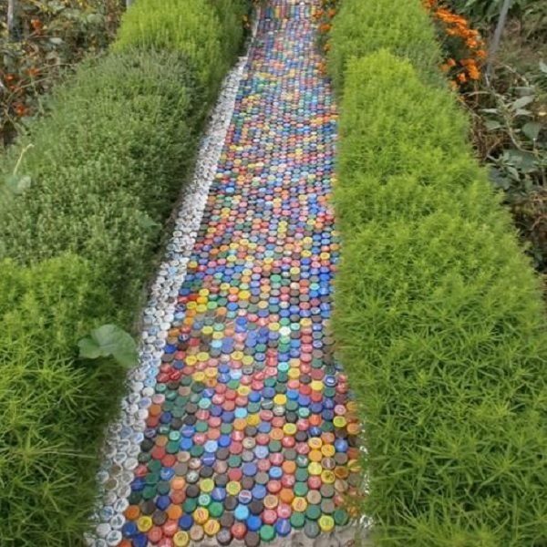 A Garden Path Made With Plastic Bottles Caps