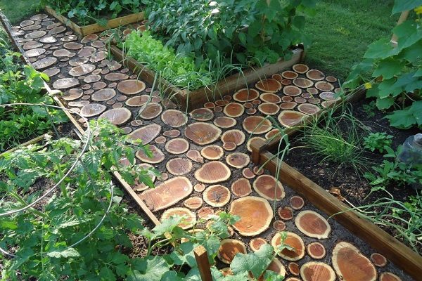 A Garden Path Made With Logs