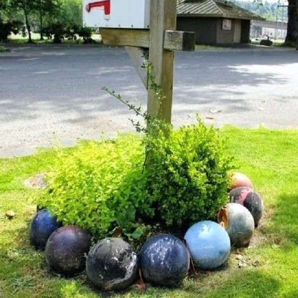 A Garden Border Made From Bowling Balls