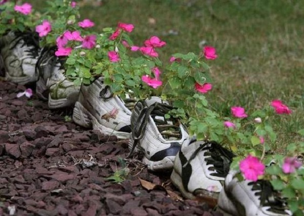 Garden Edging Made With Old Shoes and Trainers