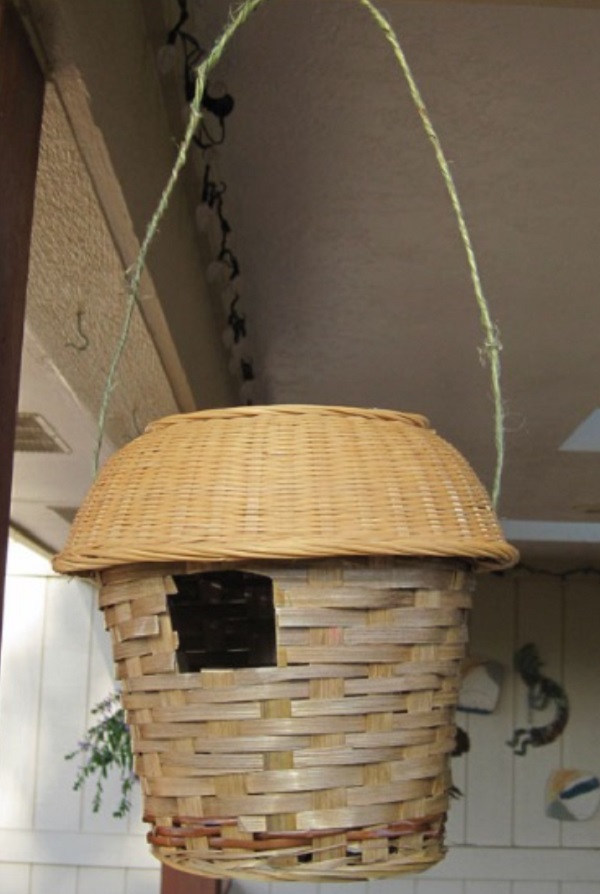 An Old Wicker Bin Used to Make a Birdhouse