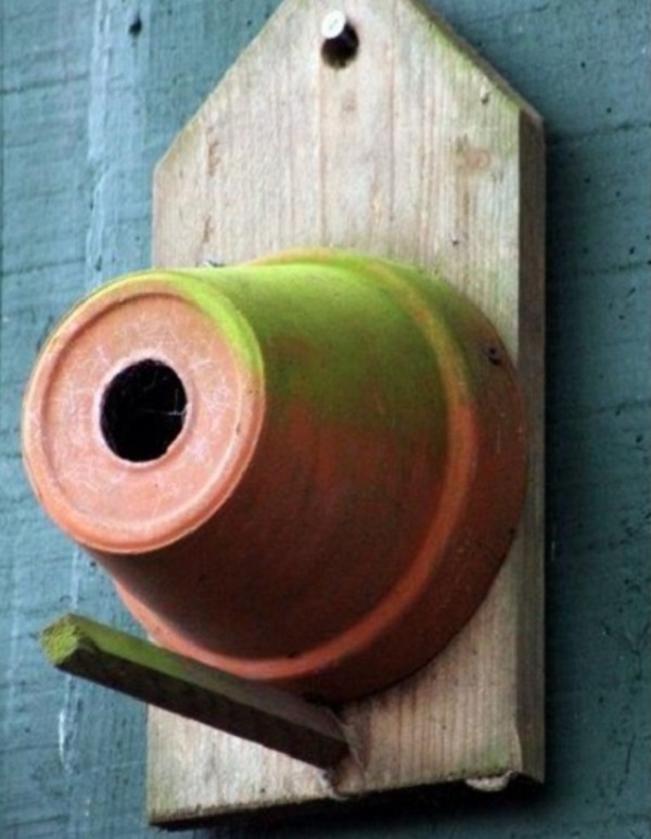 An Old Plant Pot Used to Make a Birdhouse